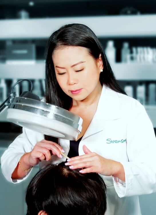 Svenson trichologist - Kim Fong - during a consultation